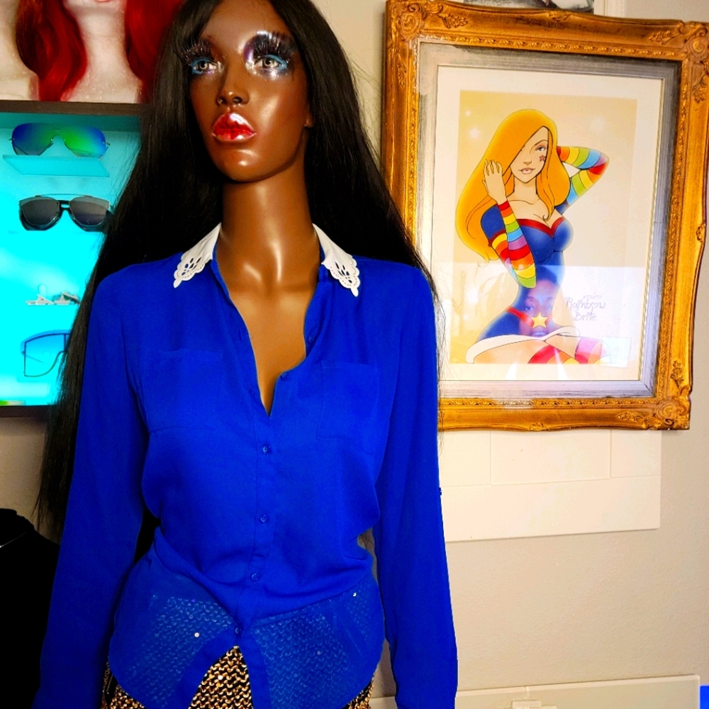 A beautiful blue button up sheer top